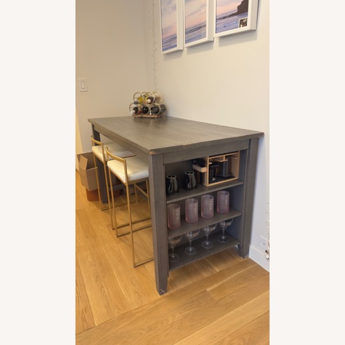 Used Ashley Furniture Dark Brown Wood Kitchen Island for sale on AptDeco