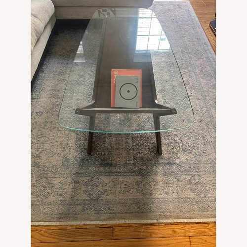 Used West Elm Dark Brown Glass Coffee Table for sale on AptDeco