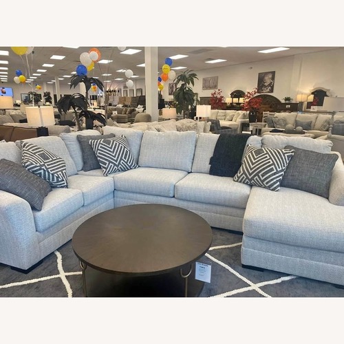Used Light Gray 2 Piece Sectional for sale on AptDeco