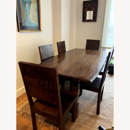 Used Vintage/Antique Dark Brown Wood Dining Table for sale on AptDeco