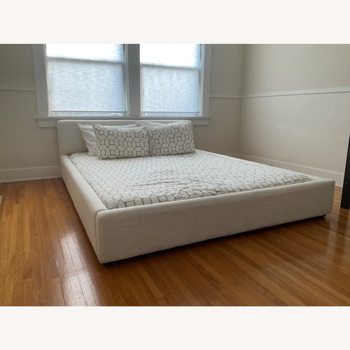 Used Room & Board Wyatt Natural Fabric Queen Bed for sale on AptDeco