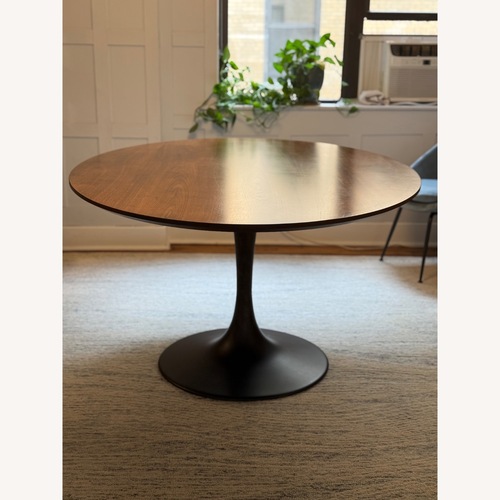 Used Williams Sonoma Dark Brown Tulip Pedestal Dining Table for sale on AptDeco