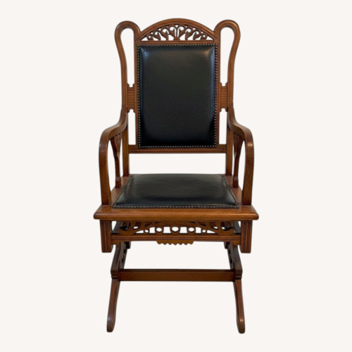 Used Vintage/Antique Dark Brown Wood Armchair for sale on AptDeco