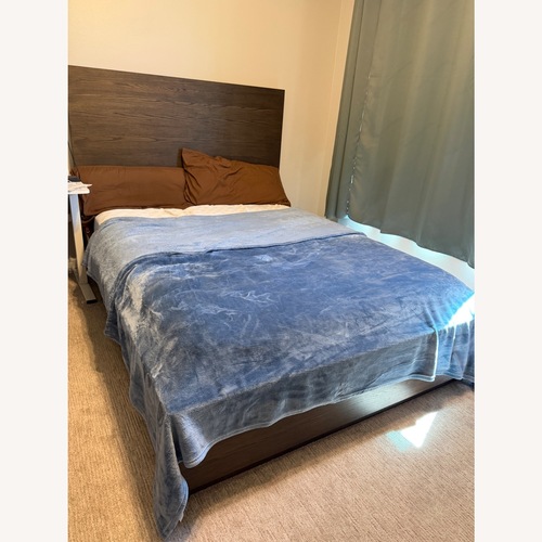 Used Living Spaces Pierce Espresso Wood King Bed for sale on AptDeco