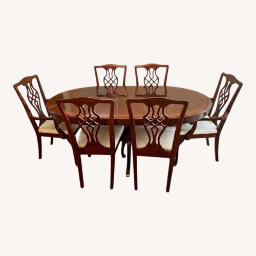Used Vintage/Antique Dark Brown Dining Set for sale on AptDeco