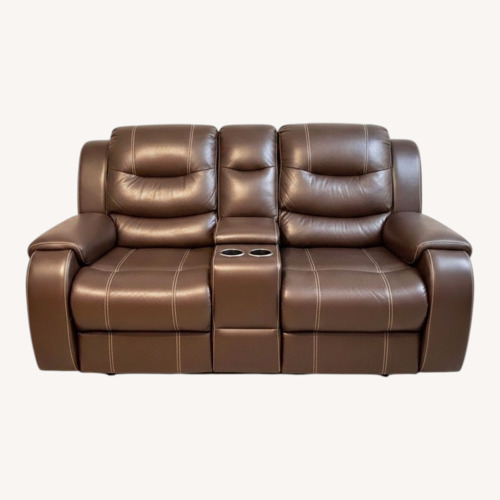 Used Ashley Furniture Dark Brown Faux Leather Loveseat for sale on AptDeco