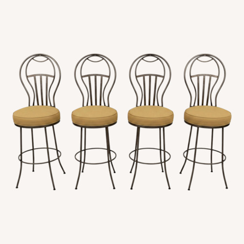 Used Wrought Iron Swivel Bar Stools with Cushion Seats for sale on AptDeco