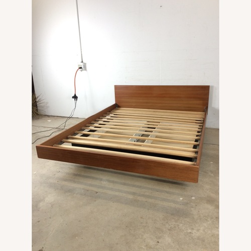 Used Danish Teak Queen Bed Frame with 2 Storage Drawers for sale on AptDeco