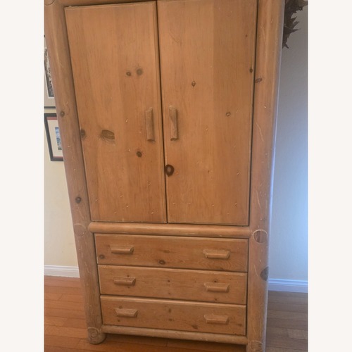 Used Vintage/Antique Natural Armoire for sale on AptDeco