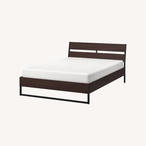 Used IKEA TRYSIL Dark Brown Wood Queen Bed for sale on AptDeco