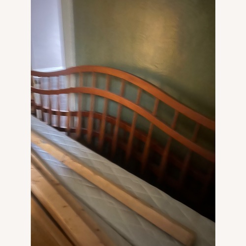 Used Vintage/Antique Light Brown Wood King Bed for sale on AptDeco