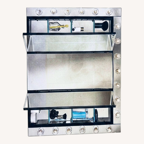 Used Silver Mirrored Glass Wall Decor for sale on AptDeco