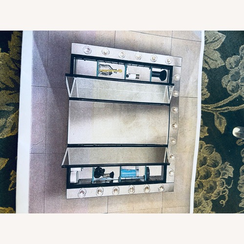 Used Silver Mirrored Glass Wall Decor for sale on AptDeco