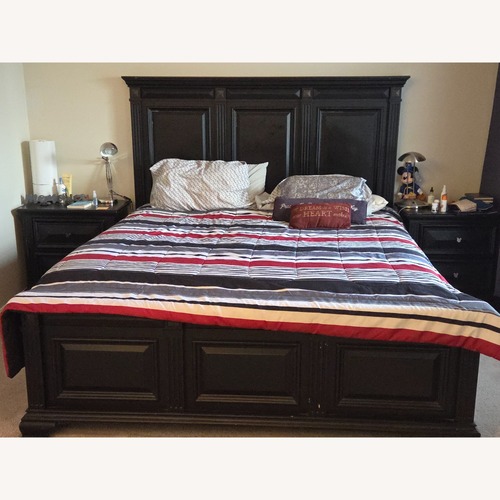 Used American Standard Black Wood King Bed for sale on AptDeco