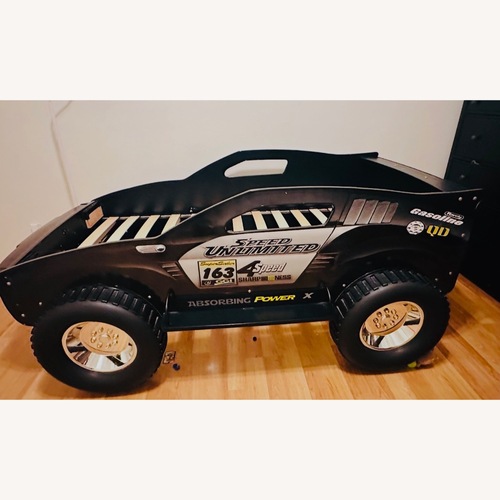 Used Black Wood Twin Bed for sale on AptDeco