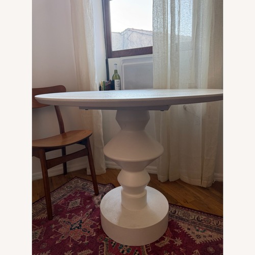 Used Urban Outfitters Vera Pedestal Dining Table for sale on AptDeco