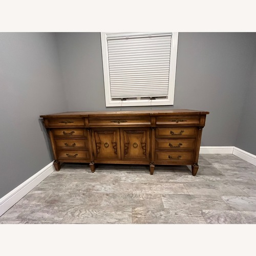 Used Vintage/Antique  Dark Brown Wood Dresser for sale on AptDeco
