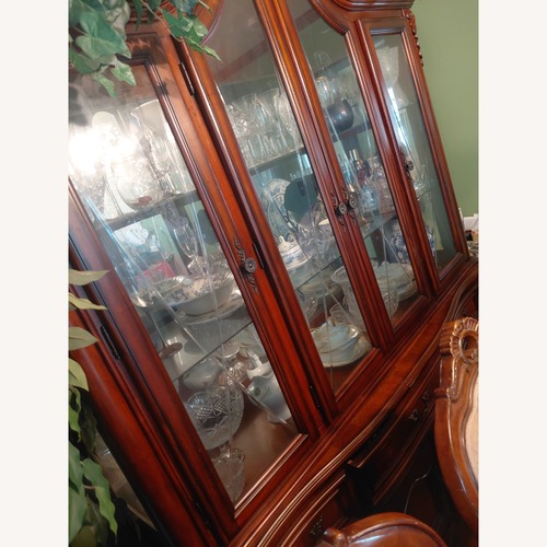 Used Marlo Furniture  Dark Brown Wood Sideboard for sale on AptDeco