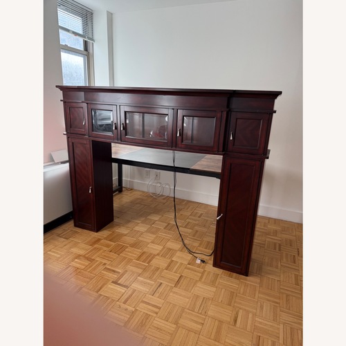Used Dark Brown Entertainment Center for TV for sale on AptDeco