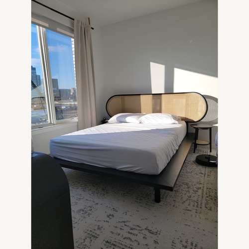 Used Crate & Barrel Anaise Cane Bed Frame for sale on AptDeco