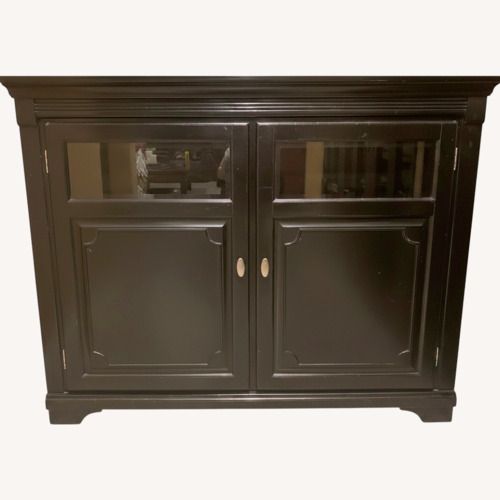Used Black Wood TV Lift Cabinet for sale on AptDeco