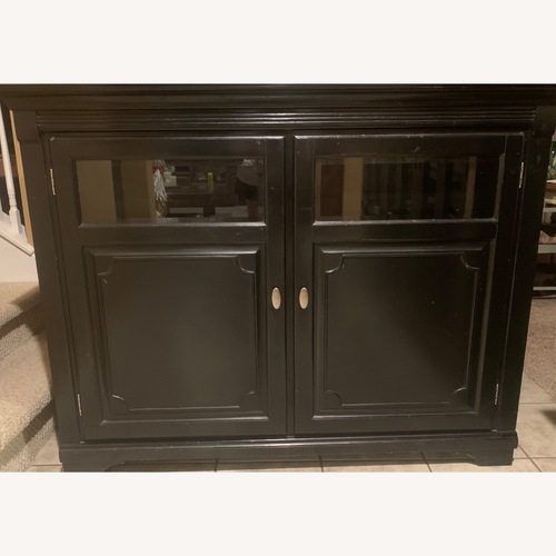 Used Black Wood TV Lift Cabinet for sale on AptDeco