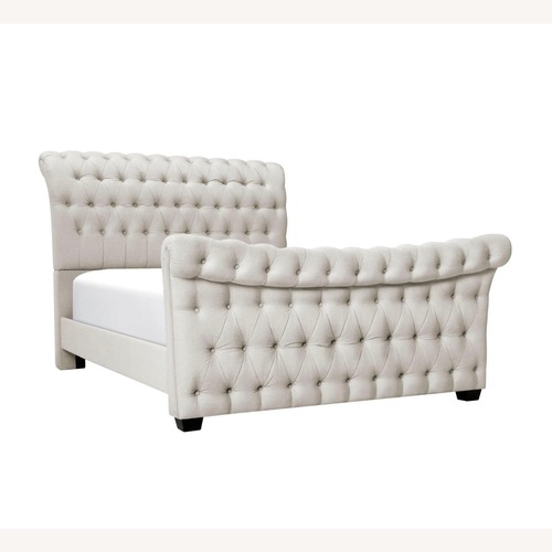 Used Raymour & Flanigan Odetta Natural Fabric Queen Bed for sale on AptDeco