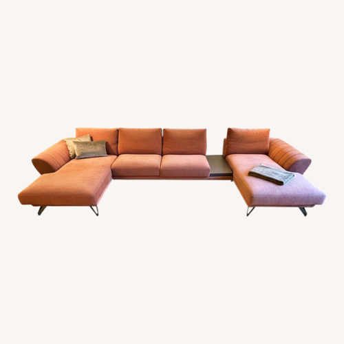 Used Roche Bobois Caractere Pink Boucle 2 Piece Sectional for sale on AptDeco