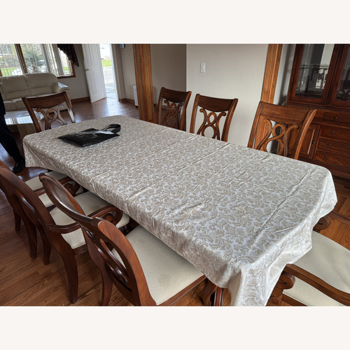 Used 9-Piece Cherry Dining Set Table + 8 Chairs for sale on AptDeco