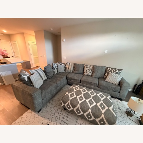 Used Rooms To Go Light Gray Fabric 2 Piece Sectional for sale on AptDeco