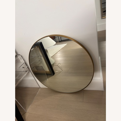 Used CB2 Infinity Brass Round Wall Mirror 24" for sale on AptDeco
