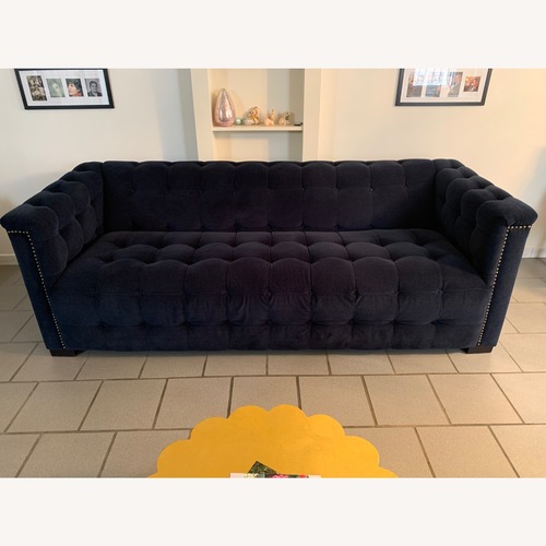 Used Raymour & Flanigan Dark Blue Tufted Sofa for sale on AptDeco