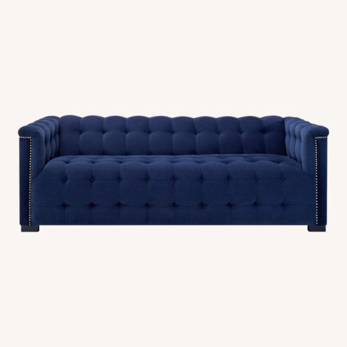 Used Raymour & Flanigan Dark Blue Tufted Sofa for sale on AptDeco