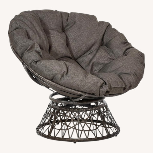 Used Dark Brown Papasan Swivel Chair for sale on AptDeco