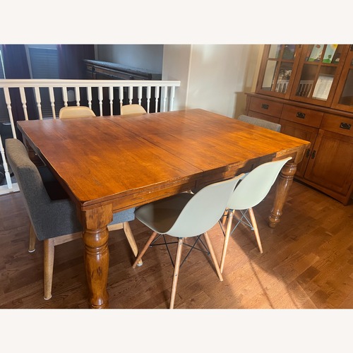 Used Dark Brown Wood Dining Set for sale on AptDeco