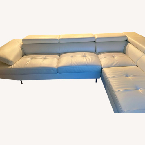 Used White Faux Leather 2 Piece Sectional for sale on AptDeco