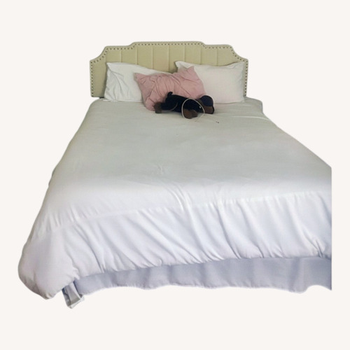 Used Queen Size Beige Upholstered Bed Frame for sale on AptDeco