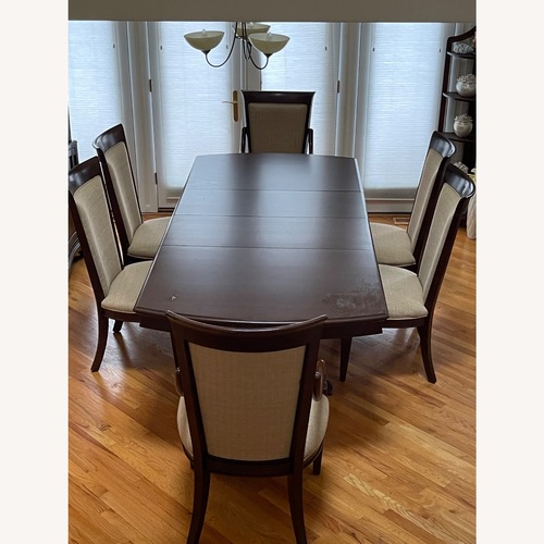 Used Raymour & Flanigan 7-piece Dining Set for sale on AptDeco