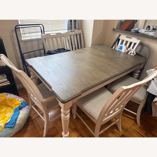 Used Light Gray Wood Dining Table for sale on AptDeco