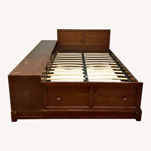 Used Dark Brown Wood Queen Bed for sale on AptDeco