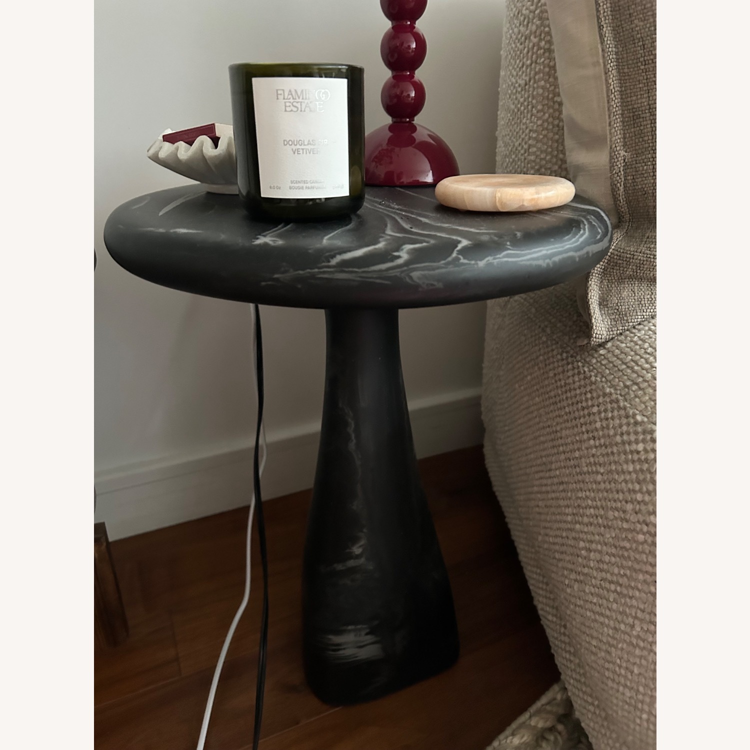 CB2 Espira Round Black Marbled Resin Side Table - image-4