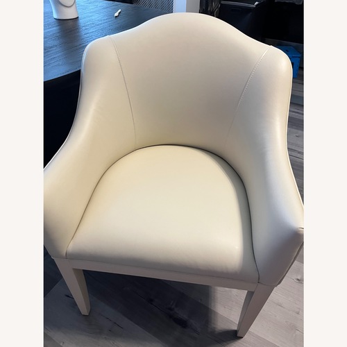 Used Two Cream Leather Dining Chairs for sale on AptDeco
