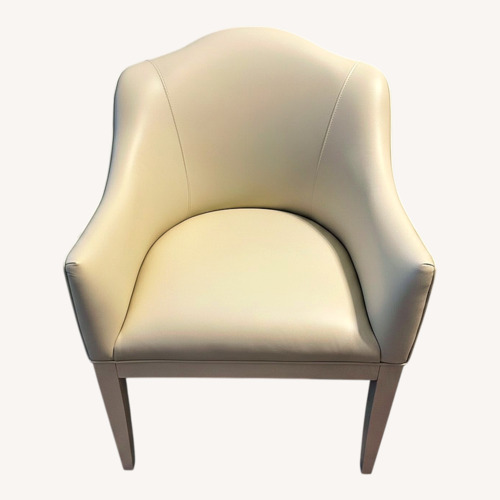 Used Two Cream Leather Dining Chairs for sale on AptDeco