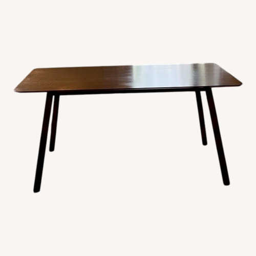 Used Dark Brown Wood Dining Table for sale on AptDeco