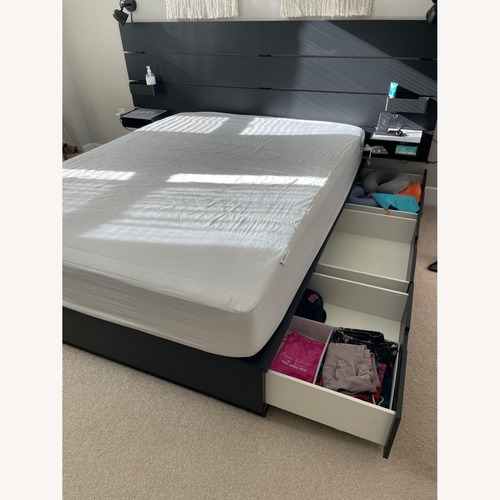Used IKEA Nordli Black Wood Queen Bed for sale on AptDeco