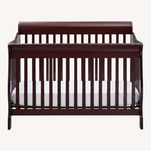 Used Delta Children Dark Brown Wood Crib for sale on AptDeco