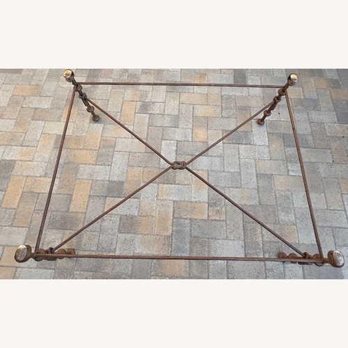 Used Glass Coffee Table with Metal Frame for sale on AptDeco