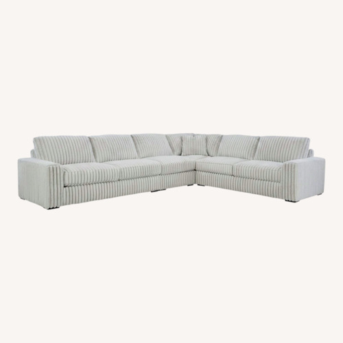 Used Ashley Furniture Stupendous 4-Piece Sectional for sale on AptDeco