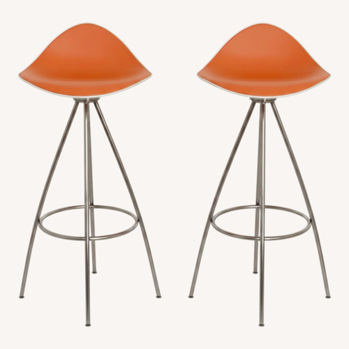 Used Onda Swivel STUA Orange Stainless Steel Stools for sale on AptDeco
