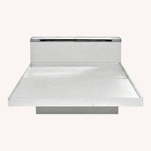 Used Pierre Cardin White Aluminum Queen Bed for sale on AptDeco
